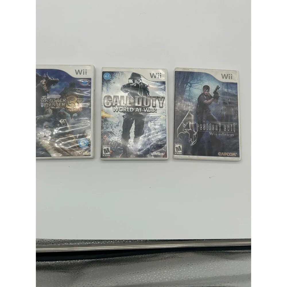 Wii 3 Game Lot Resident Evil 4 COD World at War Monster Hunter Tri Untested
